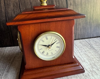 Orologio da tavolo girevole vintage della Bombay Company con termometro, barometro e igrometro, anno 2002.