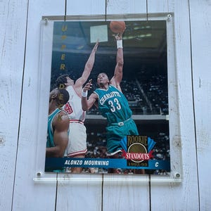Tarjeta coleccionable de novato de luto de Alonzo de los Charlotte Hornets de la NBA de 1993