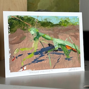 May include: A rectangular art print featuring an impasto oil painting of a green praying mantis on a brown earth surface with a green background. The text "PRAYING MANTIS" is printed in white at the bottom center, with a signature on the right.