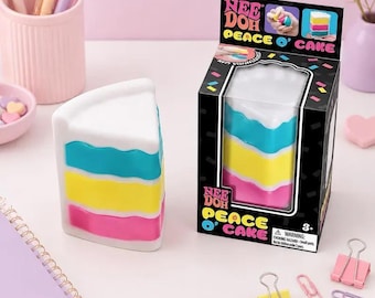 Needoh Peace O’ Cake Squishy – Juguete antiestrés con forma de rebanada de pastel de colores