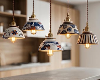Lámpara colgante de cerámica de estilo japonés, con diseños pintados y detalles en cobre, iluminación nórdica moderna.