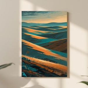 May include: A rectangular canvas print featuring an abstract landscape painting. The artwork depicts rolling hills in shades of orange, teal, and blue, with a soft, textured appearance. The painting is displayed on a neutral-colored wall.