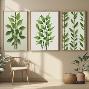 May include: Three framed botanical prints showcasing bamboo stalks and leaves in various shades of green. The prints are set against a light background and are enclosed in wooden frames. The artwork provides a natural aesthetic to any room.