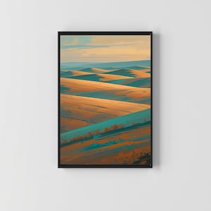 May include: A framed landscape art print featuring rolling hills in shades of orange, brown, and teal. The sky transitions from a light blue to a warm yellow. The artwork is displayed in a black frame, creating a modern aesthetic.