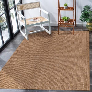 Close-up shot of the rug’s edge stitching and construction details. Reinforced borders offer a clean finish and long-lasting shape retention, even in busy areas like entryways or kitchens.