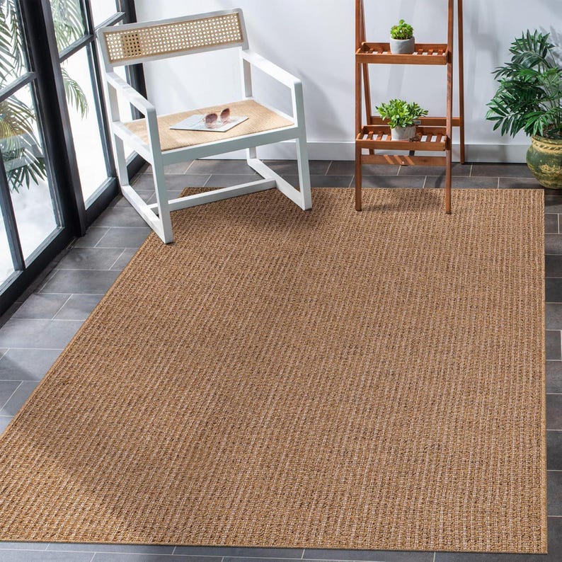 Close-up shot of the rug’s edge stitching and construction details. Reinforced borders offer a clean finish and long-lasting shape retention, even in busy areas like entryways or kitchens.