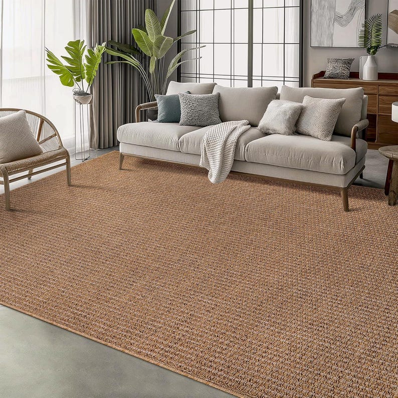 Stylish bathroom setup with a beige indoor outdoor rug outside a bathtub. The washable and quick-drying design is ideal for moisture-prone spaces without sacrificing style.