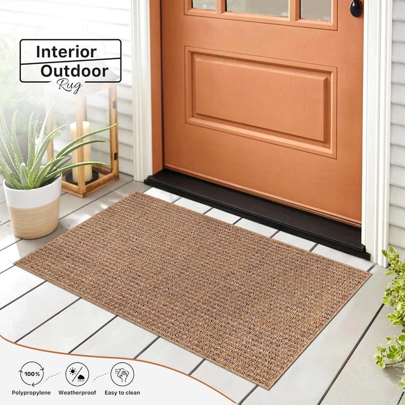 Close-up of the woven polypropylene surface showcasing the rug’s modern texture and fine details. Its flat weave prevents tripping and enhances durability in both indoor and outdoor high-traffic zones.