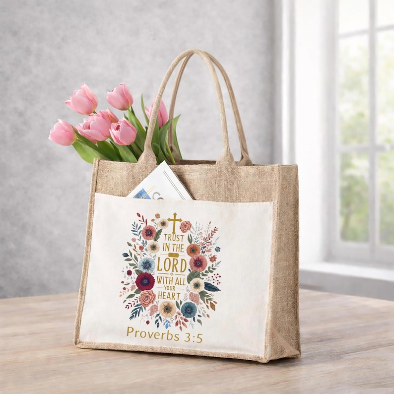 May include: A set of three ceramic mugs with a speckled, cream-colored glaze. Each mug features a different hand-painted design: a blue and green leaf, a yellow flower, and a red berry. The mugs have a simple, rounded shape.