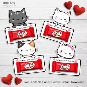 Op de afbeelding: Valentijnsdag snoephouders met cartoonkatten die borden vasthouden met Kit Kat-repen. Op de borden staat "You're purr-fect, Valentine!" en er is ruimte voor een "Van:"-bericht. Rode vilten hartdecoraties zijn ook inbegrepen.