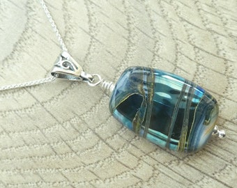 Necklace with metallic effect glass pendant blue and purple on sterling silver chain
