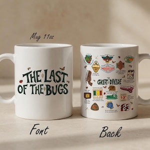 May include: White ceramic mug with the text "THE LAST OF THE BUGS" on the front and various illustrations on the back. The mug is labeled "Mug 11oz". The mug has a handle and is designed for beverages.