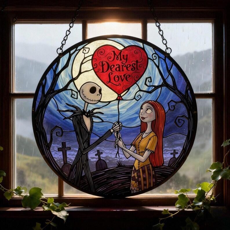 May include: A round stained glass window featuring Jack Skellington and Sally from The Nightmare Before Christmas. Jack holds a red heart-shaped balloon with the words "My Dearest Love." The background shows a graveyard and a full moon.