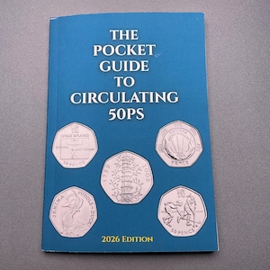May include: A blue book titled "THE POCKET GUIDE TO CIRCULATING 50PS" with illustrations of 50 pence coins. The cover displays white text and the edition year "2026".