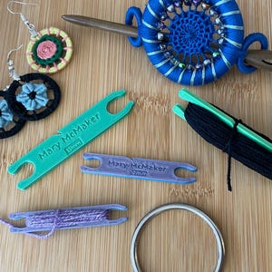 Button Bobbin (Miniature Shuttle for thread buttons)