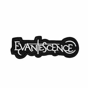 May include: A black and white embroidered patch with the word "Evanescence" in a decorative font. The patch has a black background, white lettering, and a white border, ideal for clothing or accessories.