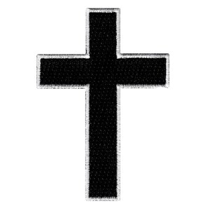 May include: A black embroidered patch in the shape of a Christian cross. The cross features a solid black center with a thick, white stitched border that outlines the entire shape, creating a high-contrast design with a textured fabric appearance.