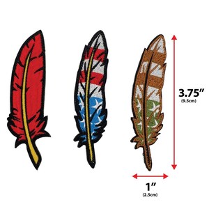 May include: Three embroidered feather patches. The red feather has yellow accents. The second feather has a design of red and white stripes and blue stars. The third feather is brown with green and white stars. Each feather is 3.75 inches (9.5cm) long and 1 inch (2.5cm) wide.
