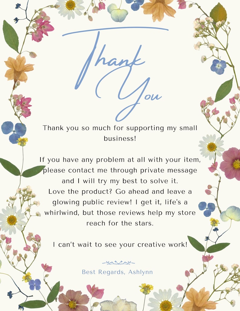 May include: A cream-colored card with the words "Thank You" in blue script, surrounded by a floral border of dried flowers in shades of pink, yellow, and blue. Text below expresses gratitude and encourages reviews.