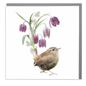 A watercolor illustration of a small brown wren with a short tail, standing in front of a cluster of purple checkered lily flowers and green foliage, on a white square greeting card.