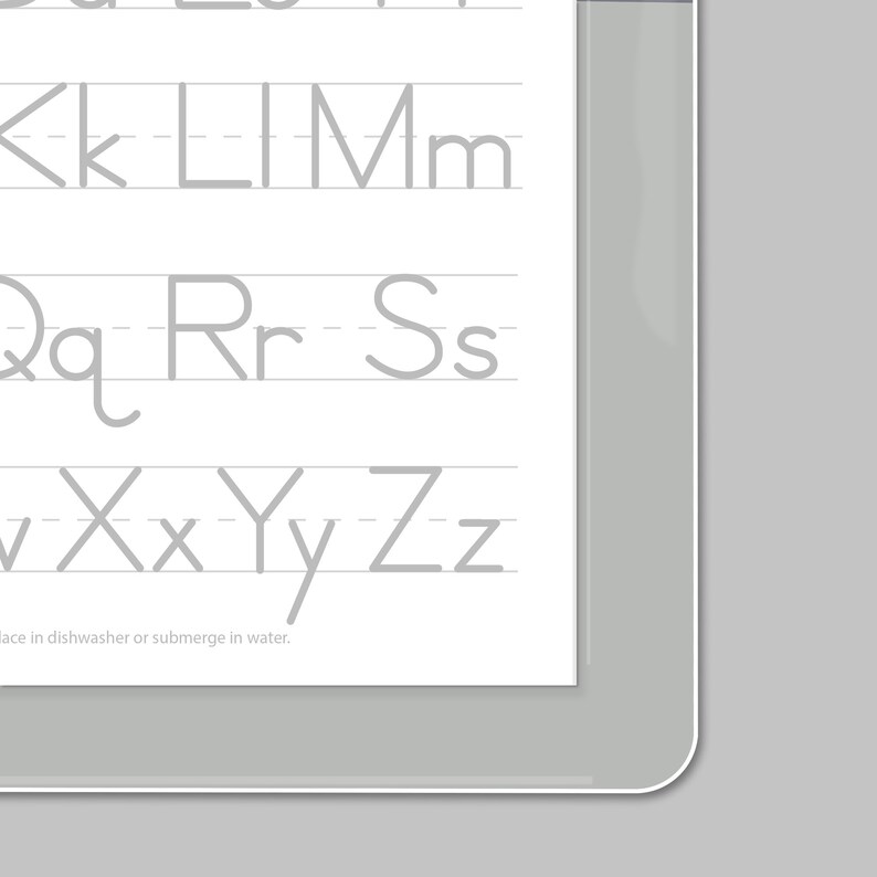 Close up of place mat corner, showing heavy, crystal clear lamination, with rounded corner