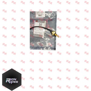 May include: An engine oil temperature sensor with a black cable and a gold-coloured sensor head, packaged in a clear plastic bag. The packaging includes labels with text and a QR code.