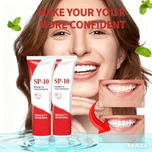 May include: Two tubes of SP-10 Probiotic Toothpaste with red and white packaging. The tubes are in front of a woman smiling, with text that reads "MAKE YOUR MORE CONFIDENT". The toothpaste is labeled "BRIGHT + WHIENING".
