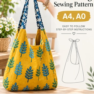 May include: A hobo bag sewing pattern featuring a mustard yellow fabric with a blue leaf print and a blue and white floral strap. The text reads Hobo Bag Sewing Pattern, A4, A0, Easy to Follow Step-by-Step Instructions, Instant Download, Print at Home or Copy Shop, A4 + A0 Included, Detailed Instructions, Beginner Friendly.