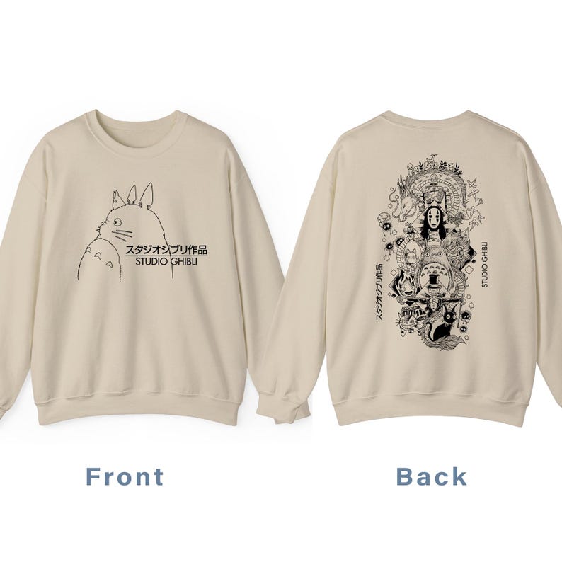 May include: Beige sweatshirt with a black and white Studio Ghibli character illustration on the front. The back showcases a detailed graphic of various characters from the studio. The text "STUDIO GHIBLI" is printed on the front and back of the sweatshirt.
