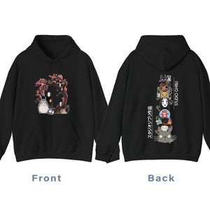 May include: Black hoodie featuring a front graphic of characters under a flowering tree and a back graphic of stacked characters with "STUDIO GHIBLI" text. The front graphic includes Totoro and No-Face.