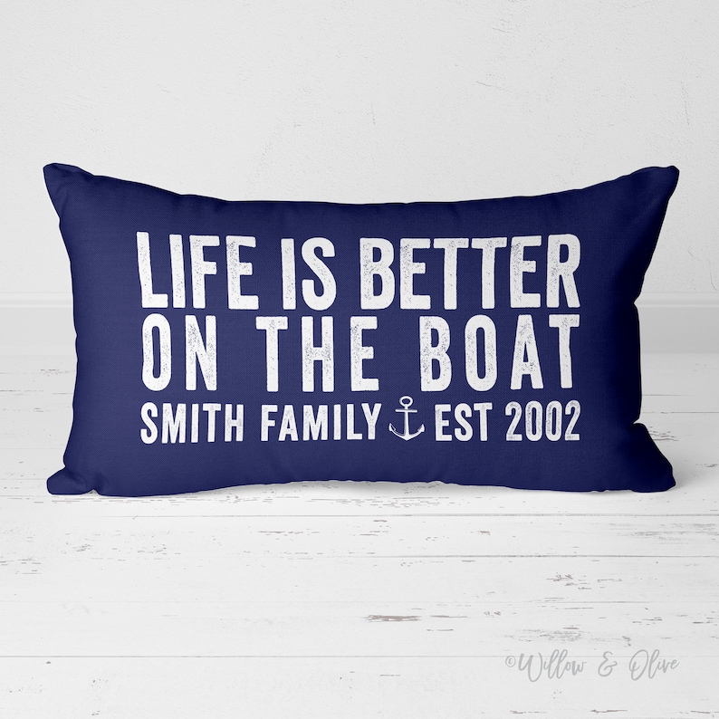 20 by 14 inch personalized lumbar pillow. Life is Better on the Boat text on first two lines. Below that reads your Family last name then the word Family with Established year. Family Name Established Year separated by Anchor. Custom color choices