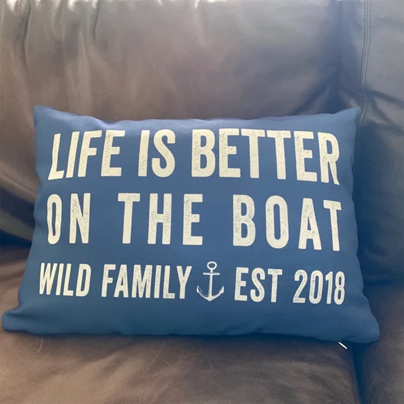 20 by 14 inch personalized lumbar pillow. Life is Better on the Boat text on first two lines. Below that reads your Family last name then the word Family with Established year. Family Name Established Year separated by Anchor. Custom color choices