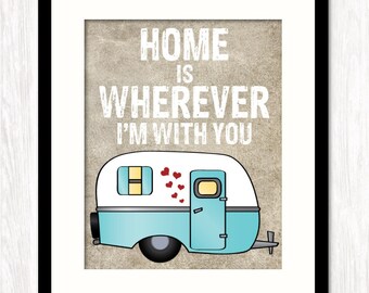 May include: A vintage-style illustration of a blue camper with the text "Home is wherever I'm with you" on a beige background.