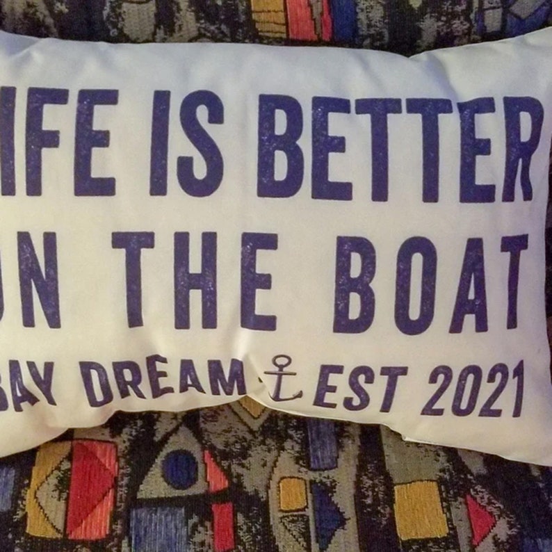 20 by 14 inch personalized lumbar pillow. Life is Better on the Boat text on first two lines. Below that reads your Family last name then the word Family with Established year. Family Name Established Year separated by Anchor. Custom color choices