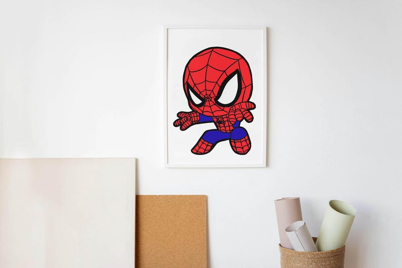 May include: A framed cartoon illustration of Spider-Man in a dynamic pose. The character is depicted with a red and blue color scheme, featuring a red mask with white eyes and a web pattern. The artwork is displayed on a white wall.