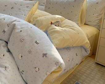 Funda nórdica con estampado de animales azules y lazo de oso y gato