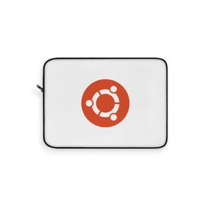 May include: A white rectangular laptop sleeve featuring a black zip along the left side and a centred orange circular logo with three stylised white figures connected by a central ring, representing the Ubuntu operating system branding.