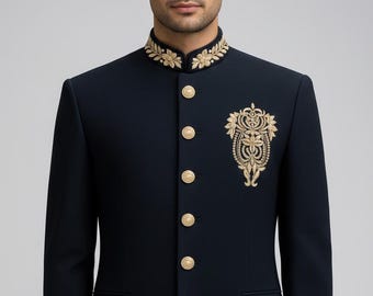 May include: A navy blue formal jacket with gold embroidery on the collar, chest, and cuffs. The jacket features a mandarin collar, gold buttons, and a decorative embroidered emblem on the chest. This elegant jacket is suitable for special occasions.