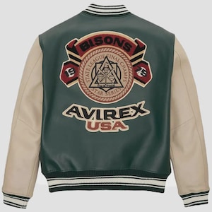 May include: A green and tan varsity jacket with the text "Bisons" and "Avirex USA" on the back. The jacket has tan sleeves, a striped collar, and a patch with the words "State League Final Champs" and "Star Series".