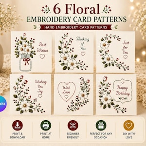 May include: A set of six white cards featuring floral embroidery patterns with text including Best Wishes, Thinking of You, Just for You, Wishing You Joy, With Love, and Happy Birthday. The designs incorporate green leaves, red berries, and white flowers.