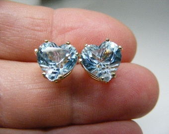 Vintage Faceted Carved Blue Topaz Heart Stud Earrings in 14k Yellow Gold.....  Lot 4730