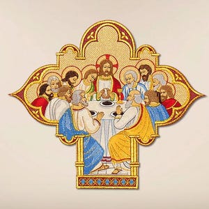 May include: Embroidered religious artwork depicting the Last Supper. The image features Jesus and his disciples gathered around a table, with detailed stitching in various colors. The artwork is framed with a gold border and has a cross-like shape.