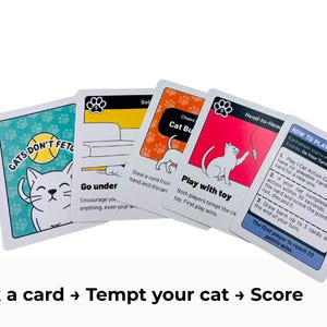 May include: A set of five playing cards from the game Cats Don't Fetch. The cards feature illustrations of cats, paw print patterns, and text including instructions like Go under, Cat Burglar, Play with toy, and a How to Play card with rules.