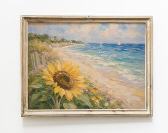May include: Oil painting of a beach scene with a large yellow sunflower in the foreground. The painting features a sandy beach, blue ocean, and sailboats under a cloudy sky. The artwork is framed.