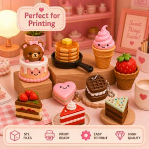 May include: A collection of miniature food-themed figurines including a bear-topped cake, a stack of pancakes in a black skillet, a pink ice cream cone, a strawberry in a waffle cup, a heart-shaped macaron, a waffle sandwich, and cake slices.