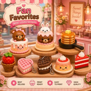 May include: A collection of miniature food-themed figurines including cakes with bear and rabbit faces, a stack of pancakes in a skillet, a strawberry in a waffle cone, heart-shaped waffles, a pudding cup, and a slice of cake on wooden stands.