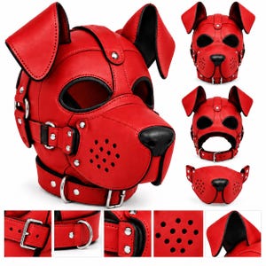May include: A bright red dog mask featuring large floppy ears, a black nose, and eye cutouts. The mask includes a perforated snout section, silver-toned metal hardware, buckles, and D-rings. The design incorporates a neck collar and straps.