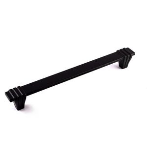 May include: A black cabinet pull with a rectangular bar and square end pieces. The ends feature a stepped design, adding a decorative element. This modern handle is designed for easy installation and use. The length is approximately 20 cm.
