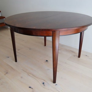 Danish Modern Omann Jun Rosewood Round to Oval Dining Table No.55 with One Leaf image 1