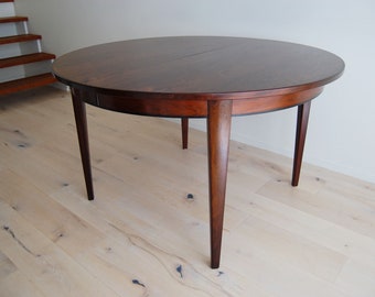 Danish Modern Omann Jun Rosewood Round to Oval Dining Table No.55 with One Leaf